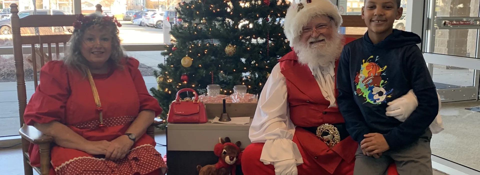 santa mrs claus and child